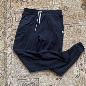 Gently used Vuori Performance Jogger in black, Size small tall.